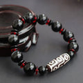 Black agate dzi bead bracelet with geometric 11mm chalcedony beads