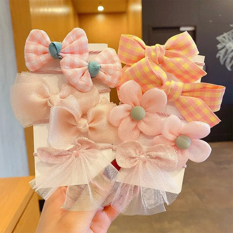 Fabric hair bow set for children with bow flower pattern in multiple colours