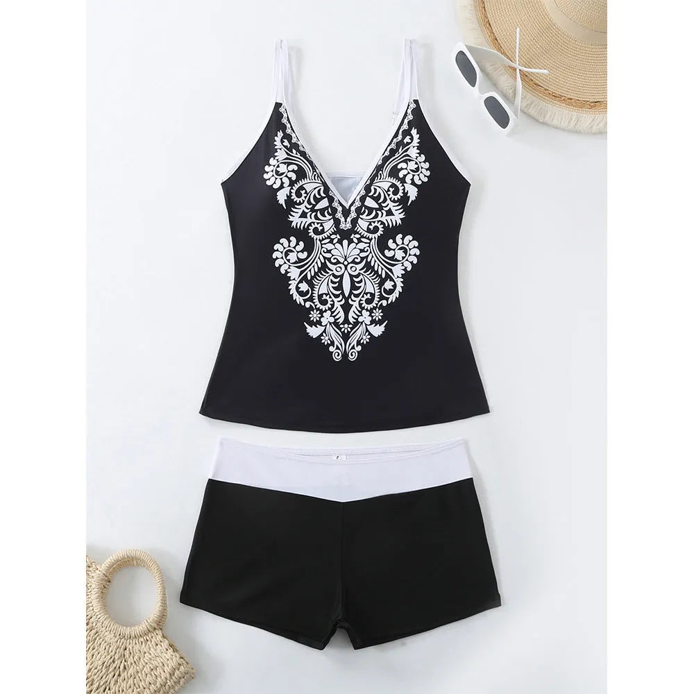 Women's plus size printed swimsuit in black or rose red, shown in briefs style.