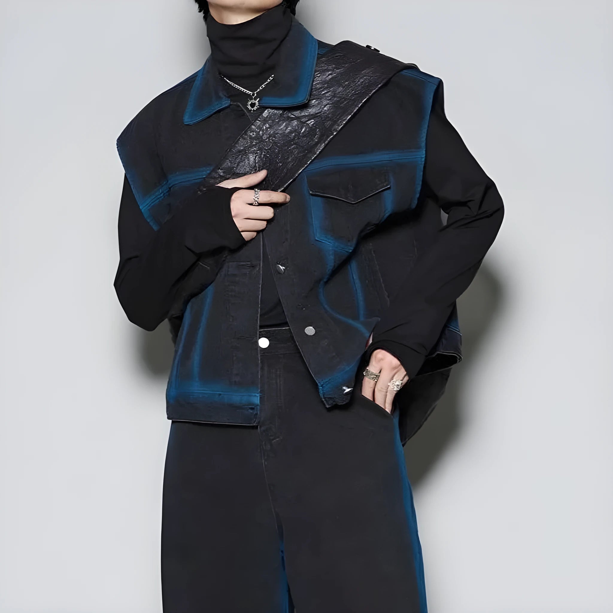 Distressed denim two-piece set with spray colour gradient on sleeveless vest and matching jeans