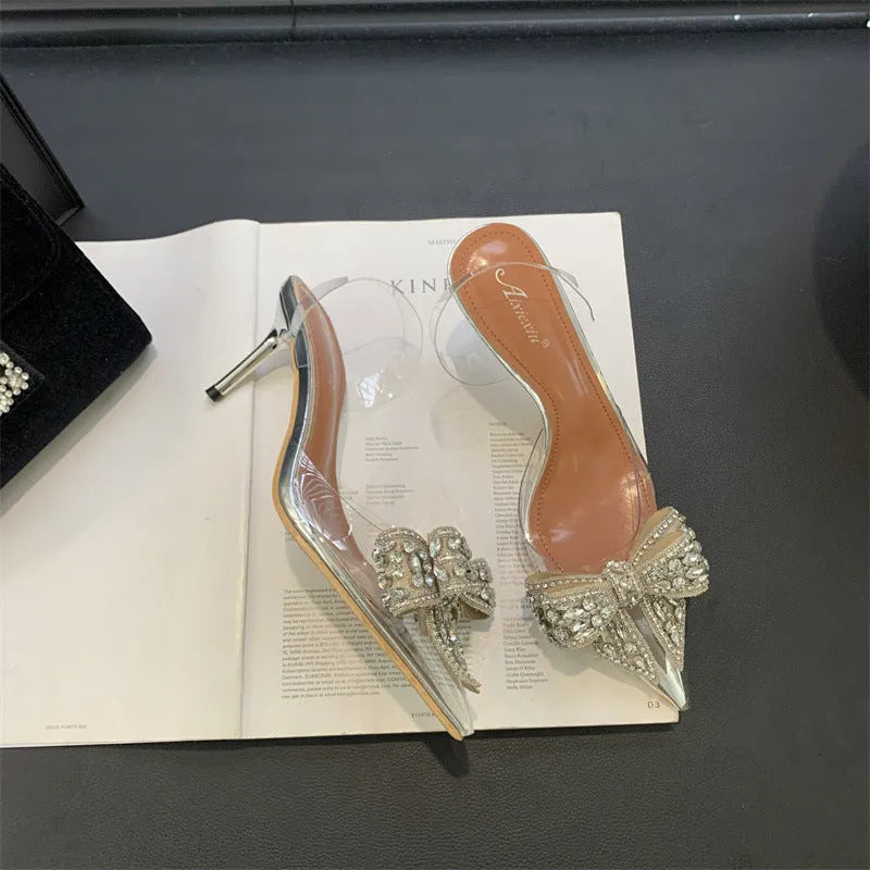 Silver pointed toe bow rhinestone transparent high heel sandals with slip-on design