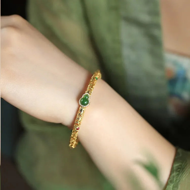 Retro women's bracelet with opening xiangyun gourd charm in gold-plated silk finish on copper base