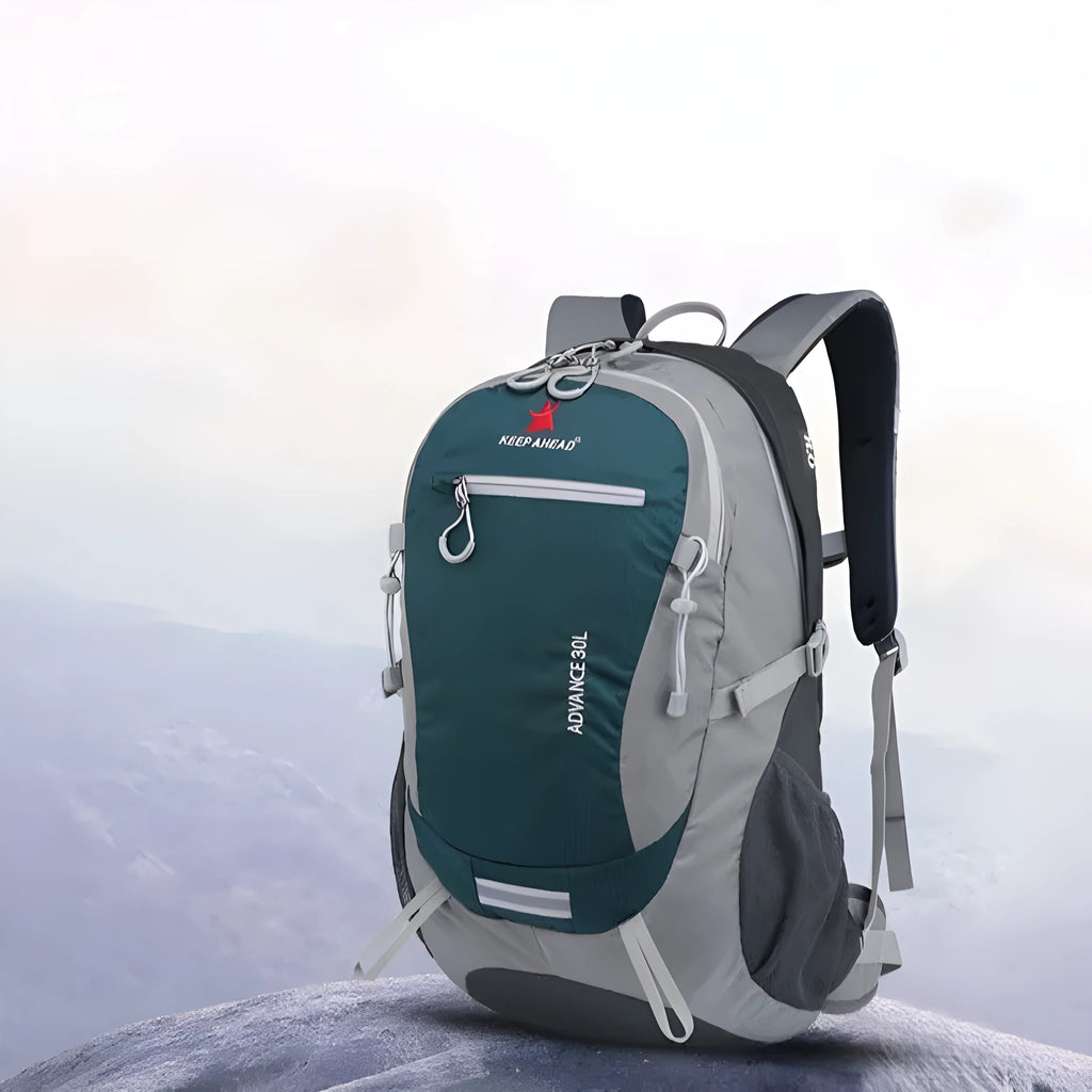 30L nylon waterproof backpack in dark green with airpillow straps on outdoor trail