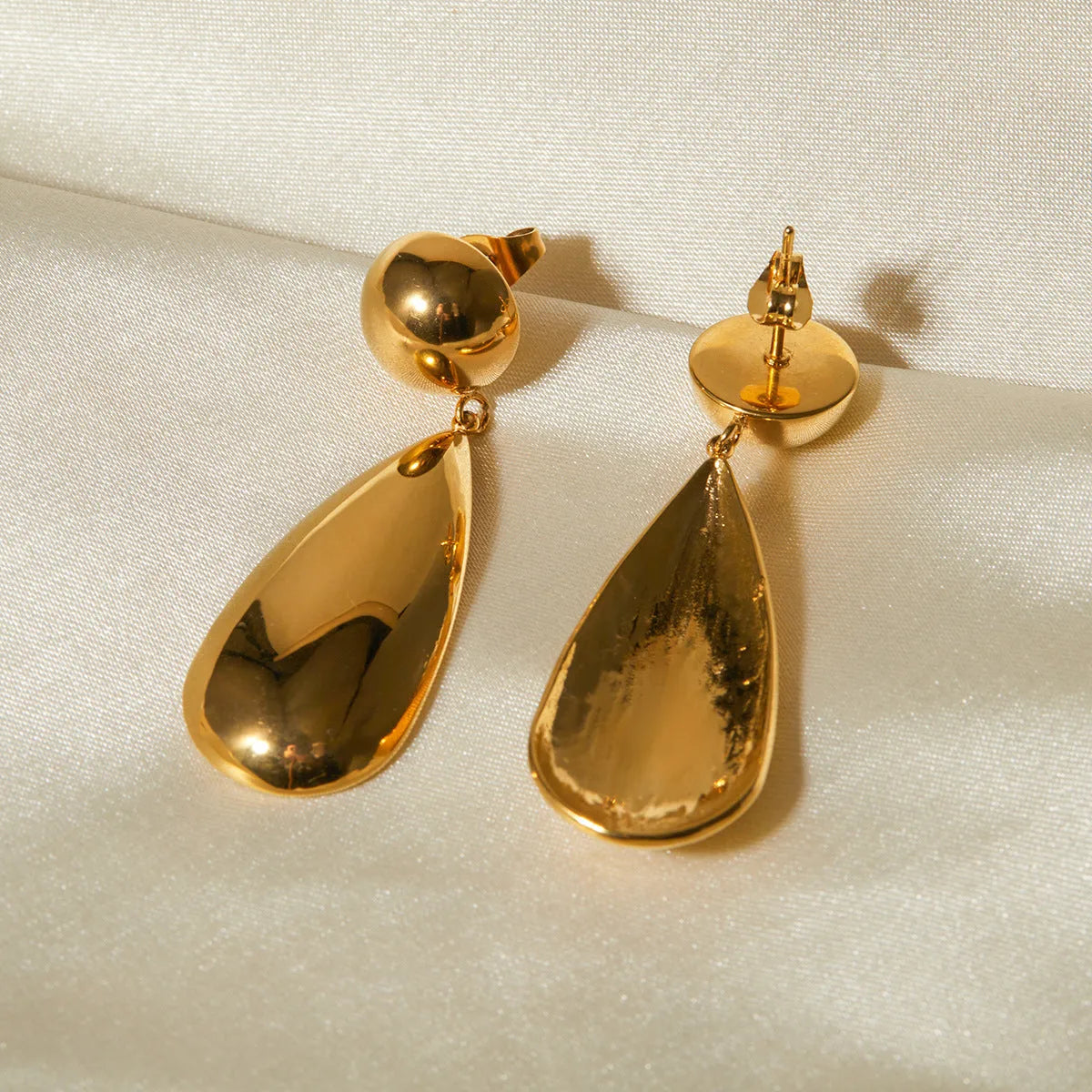 Gold stainless steel hemisphere water drop pendant earrings geometric jewellery design