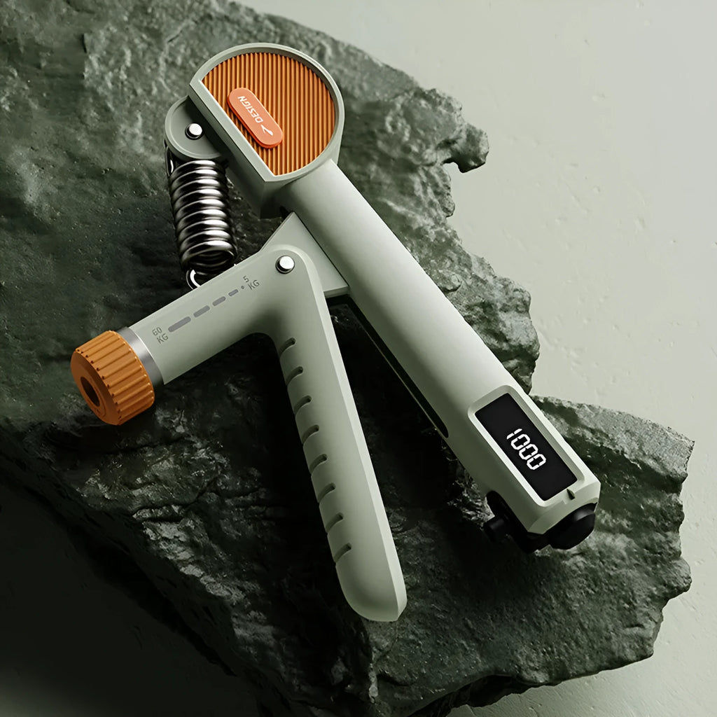 Adjustable spring hand grip strengthener in ABS plastic for home fitness and massage.
