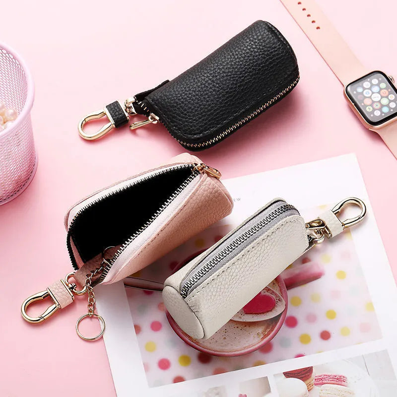 Men's black PU leather zipper key ring case showing waterproof key organiser with car keys