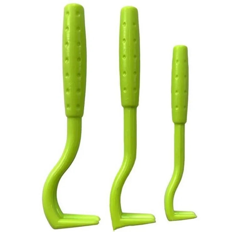 Three plastic tick removal clips in blue and green colours for pet grooming