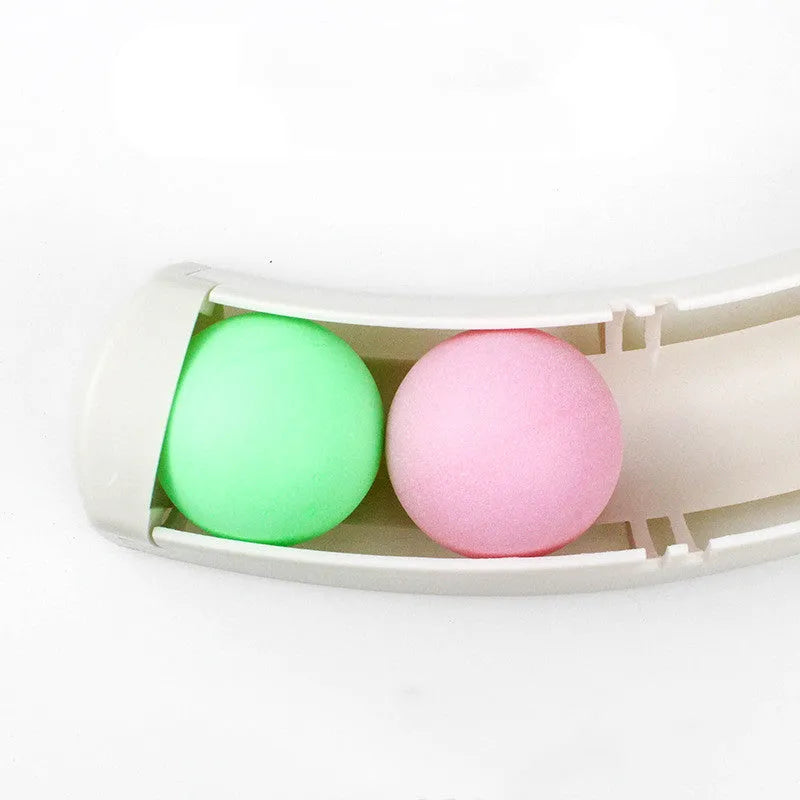 White plastic curved cat track toy, 34cm, fixed to a smooth surface with two small balls in the channel