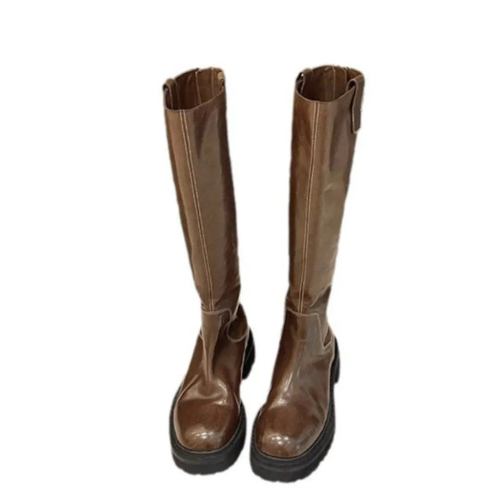 Black women's knee-high chunky heel boots with round toe and back zipper.