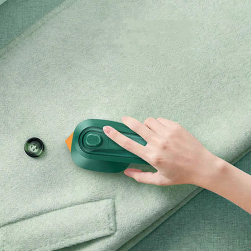 Dark green portable hanging steam iron with ceramic panel and handheld design