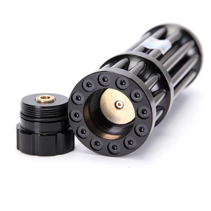 Black anodised aluminium blue laser flashlight with tail switch, shown next to an 18650 battery.