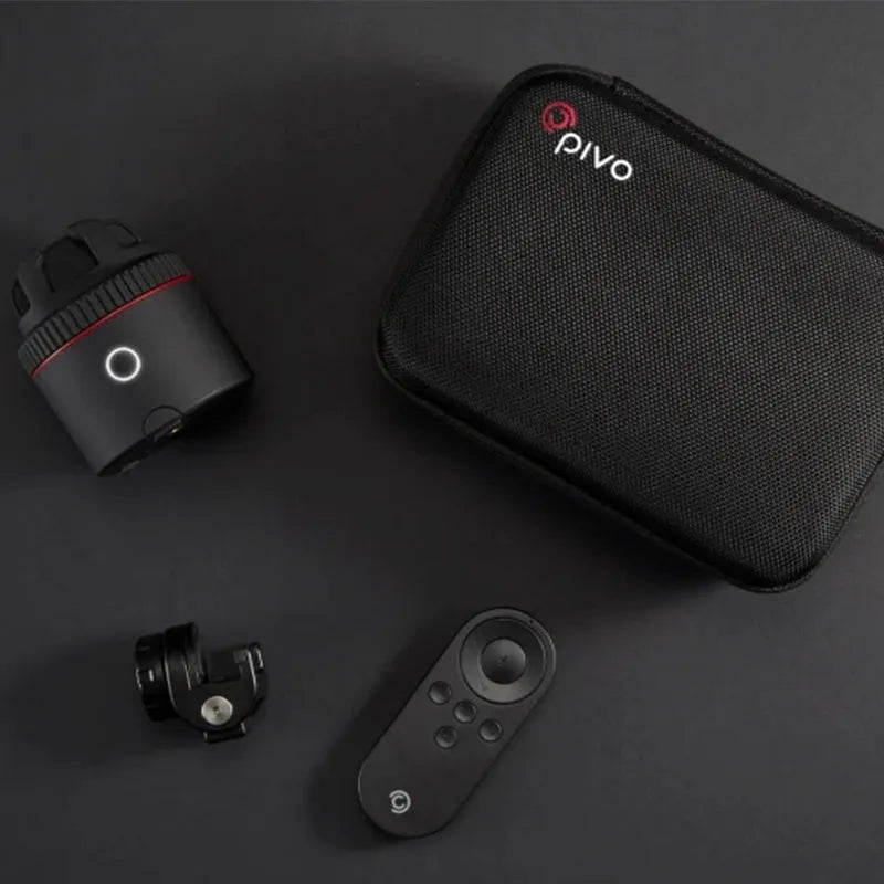 Black matte PIVO facial tracking camera mounted with a smartphone, showing 360-degree rotation base.