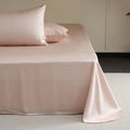Light grey Tencel Lyocell bed sheet with twill weave, shown folded to display texture and solid colour.
