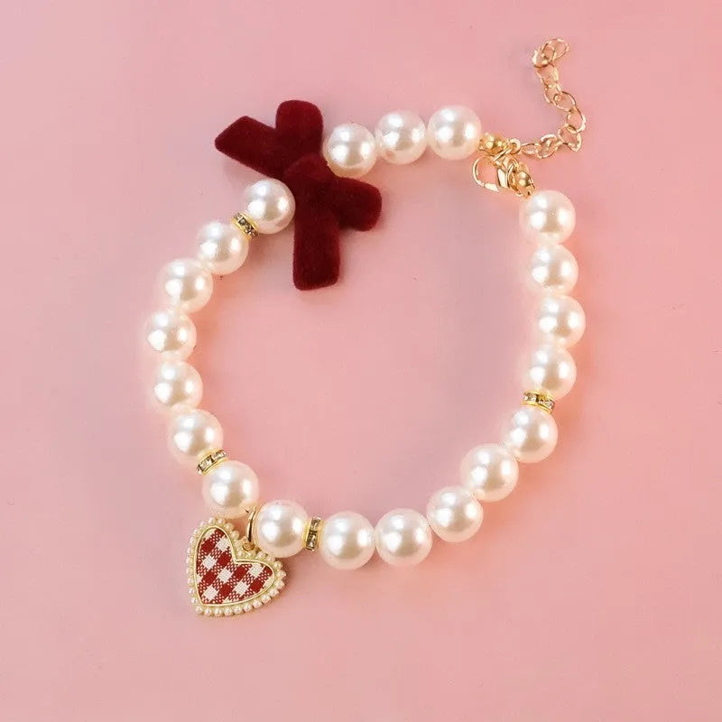 Retro plaid plastic bow necklace for cats and dogs, available in black, pink, and red sizes XS to L