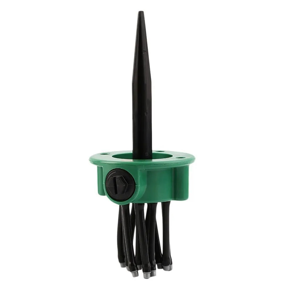 Green adjustable lawn sprinkler with bendable plastic nozzles on circular base