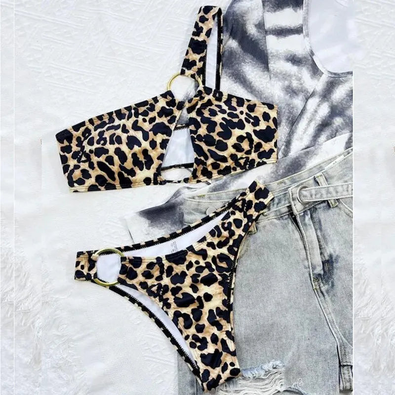 Women's hollow leopard print polka dot nylon bikini set with top and shorts, available in S M L sizes