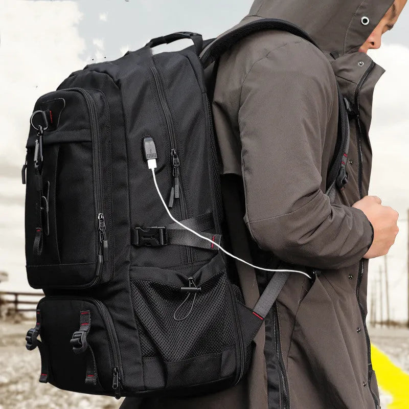 Black Oxford cloth travel backpack with 17 inch computer pocket, USB charging, and wet and dry separation