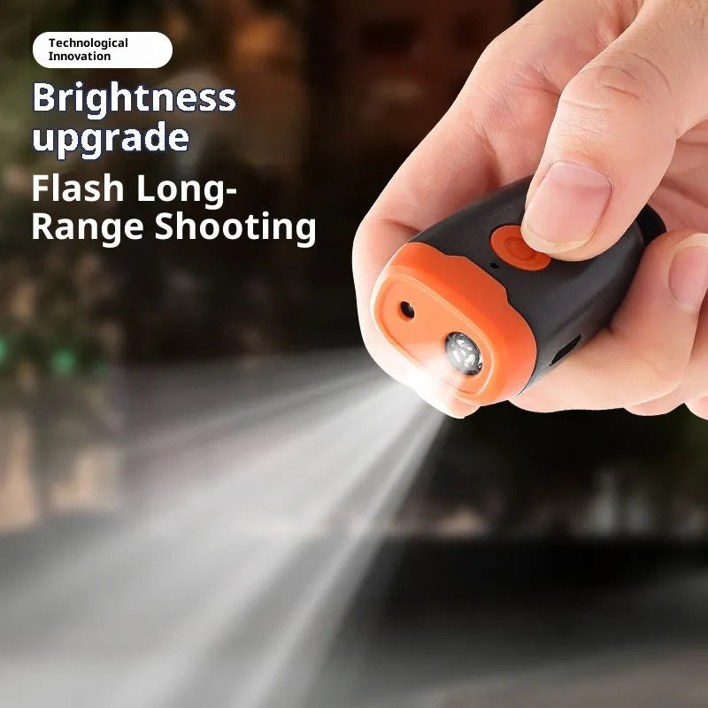 Mini ultrasonic dog dispeller in black and orange, 3x2x6cm ABS plastic portable bark stopper