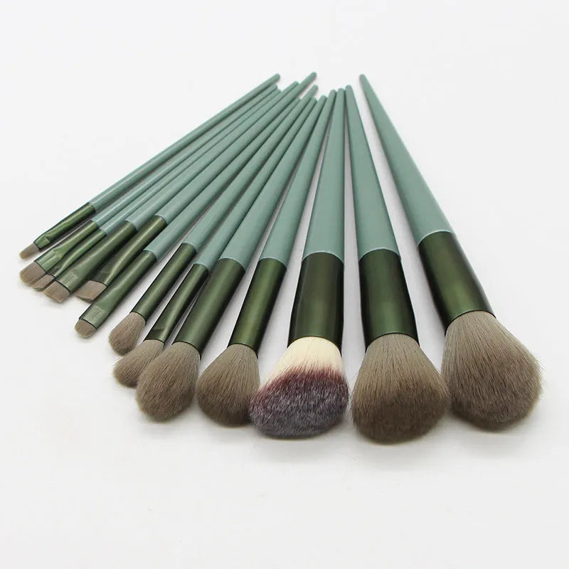 13 piece green makeup brush set with man-made fibre bristles and plastic handles