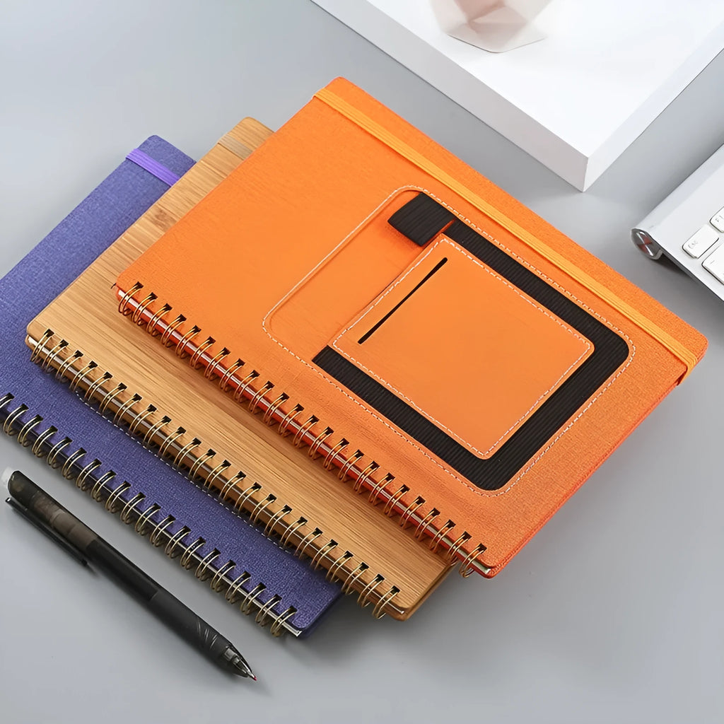 Erasable coil notebook with customisable cover options, featuring waterproof rock paper and included pen