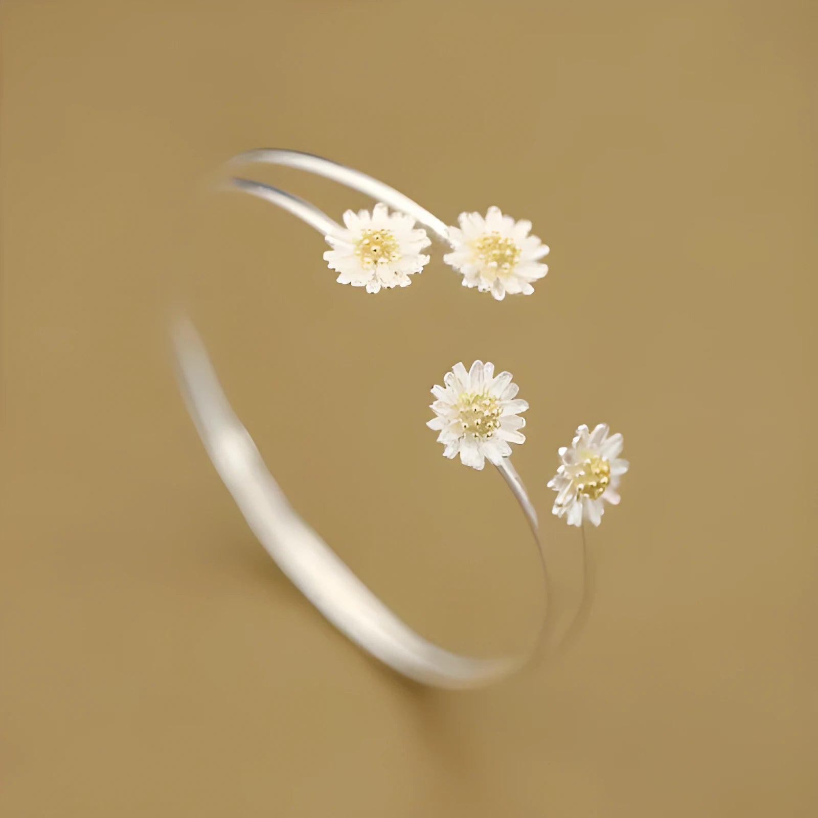 S925 sterling silver double daisy bracelet on a plain background, showing two daisy-shaped elements in a layered design