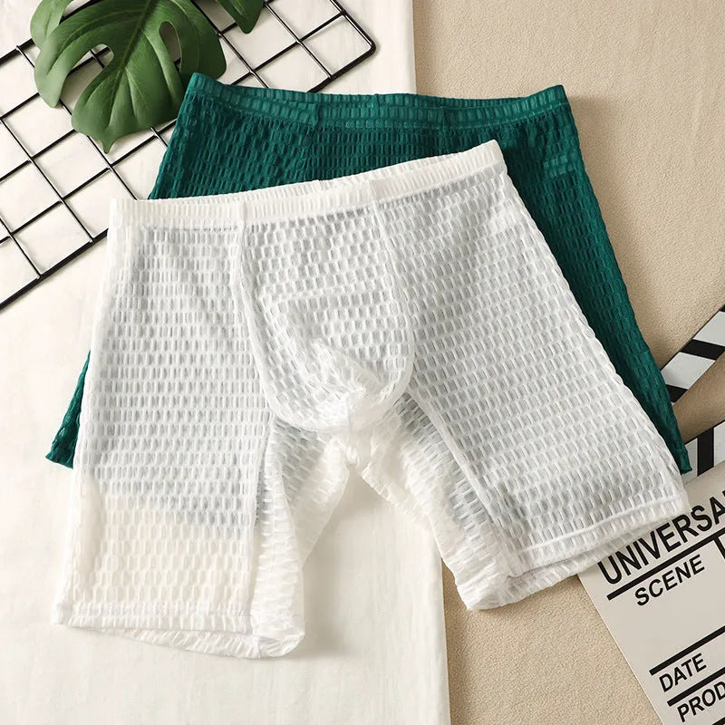 Men's solid colour lace boxer shorts on a white background, showing shaping design.