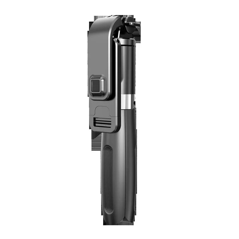 Black Bluetooth selfie stick with wireless remote, extended next to a phone and GoPro camera on its tripod base.