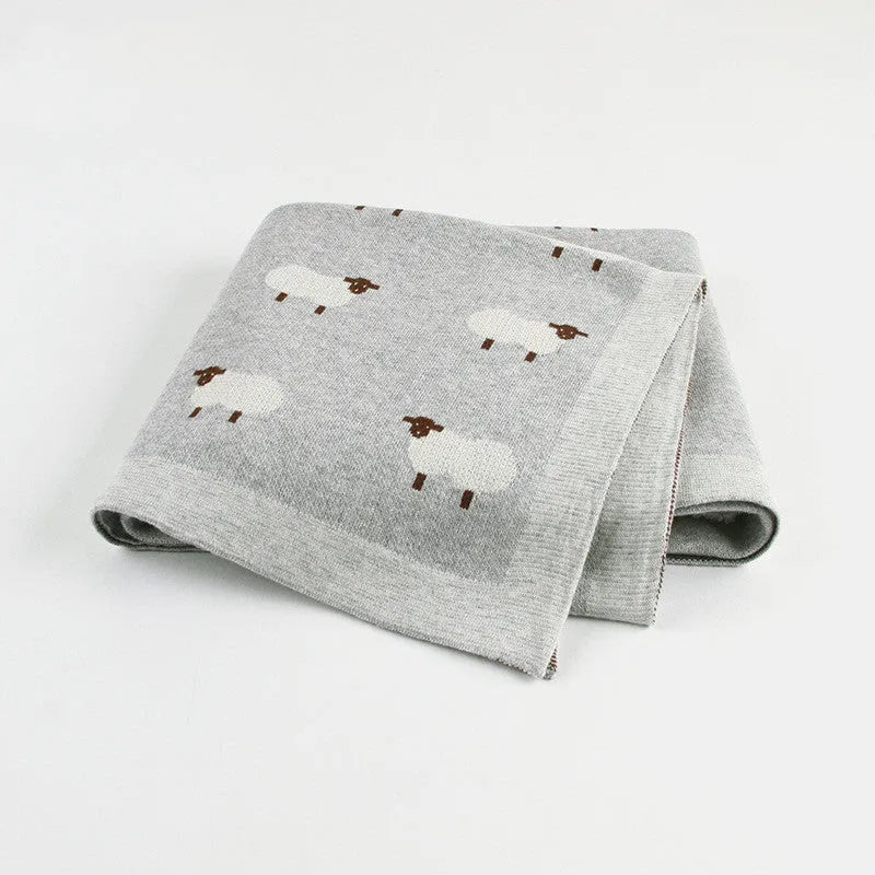 Grey and pink 100x80 cm baby sheepskin blanket made from 100% cotton fabric for cot and pram use.