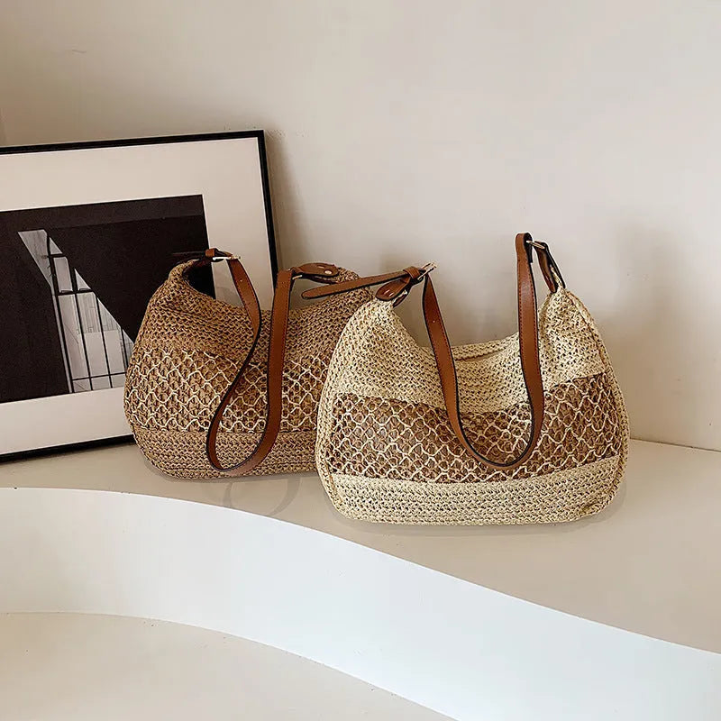 Women's khaki straw cross body bag with a square shape and outer pocket.
