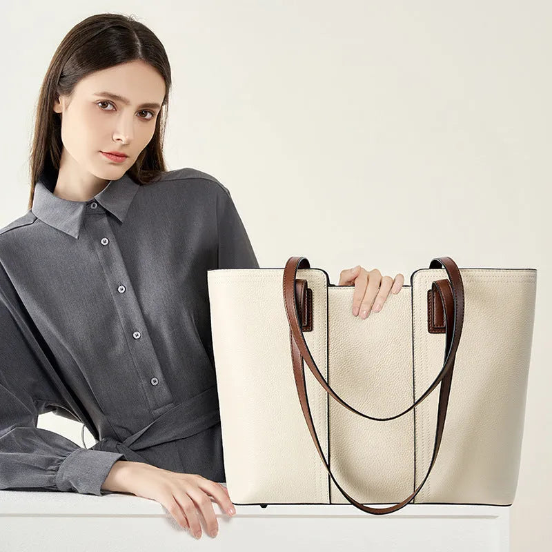 Women's genuine leather crossbody bag with horizontal square design and multiple interior compartments in black colour