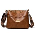 Brown PU leather cross body messenger bag with multiple compartments and sandwich pocket design