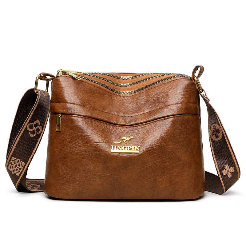 Brown PU leather cross body messenger bag with multiple compartments and sandwich pocket design