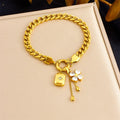 Tassel stainless steel bracelet and necklace set with flower and butterfly motifs for women