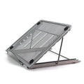 Adjustable steel laptop stand in silver, folded flat, showing spray-coated finish and gear mechanism.