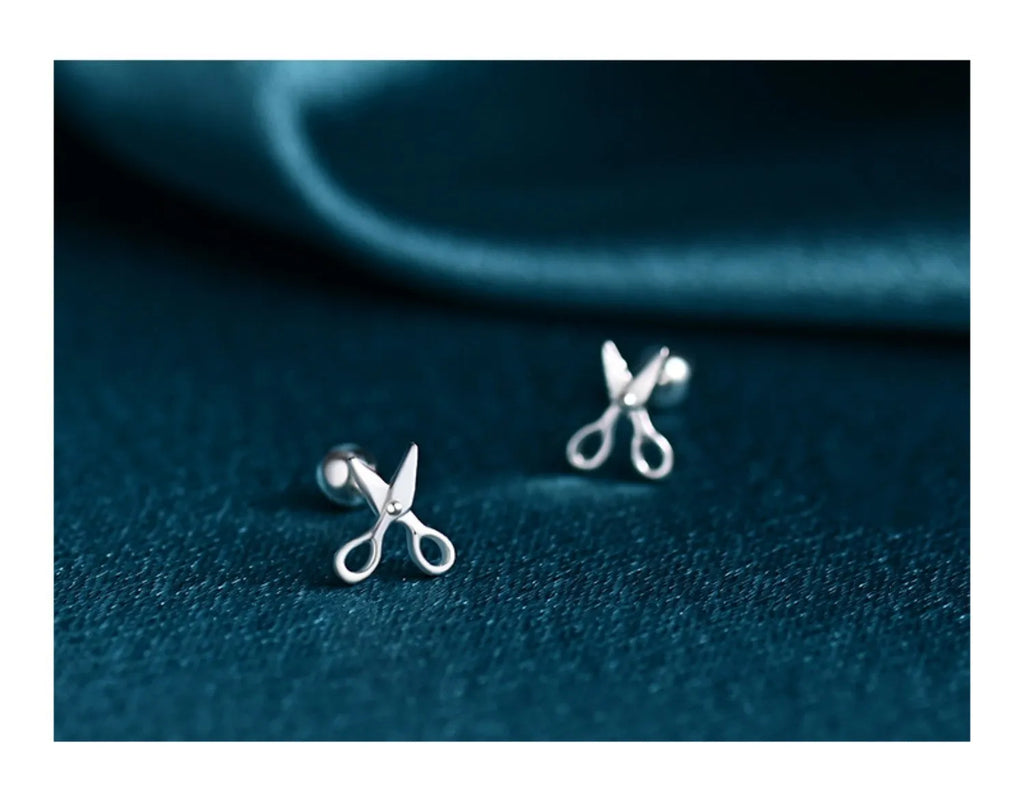 Silver ear studs with screw fastening and miniature scissors design