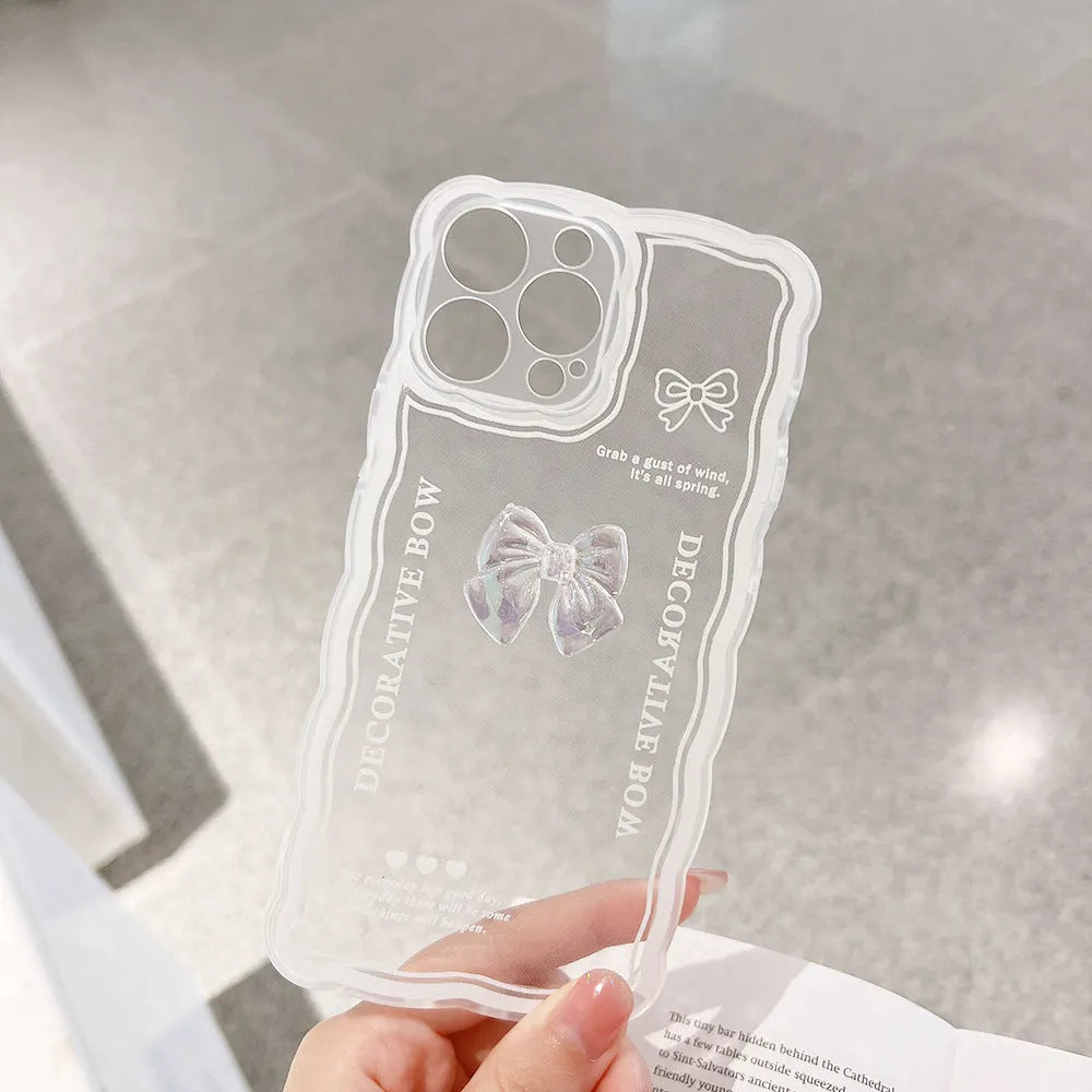 Transparent iPhone case with 3D ice-through bow design on TPU material showing phone compatibility