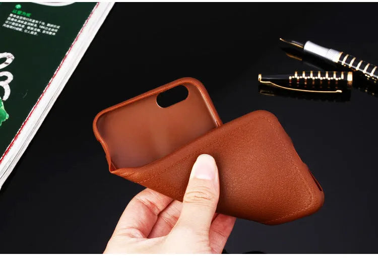 Slim leather and TPU iPhone case shown in black, brown, navy blue, and wine red colours