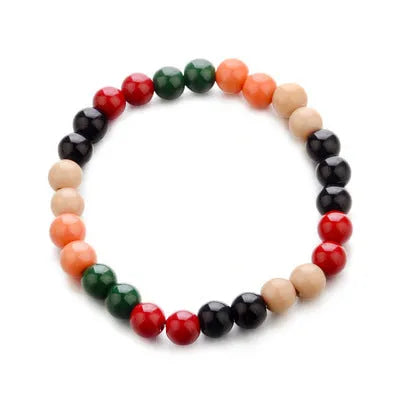 Natural lava stone bead bracelet for men and women on a wrist, showing ethnic style and essential oil application.