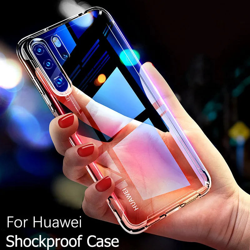 Transparent airbag drop-resistant TPU phone case for a Huawei smartphone on a table.