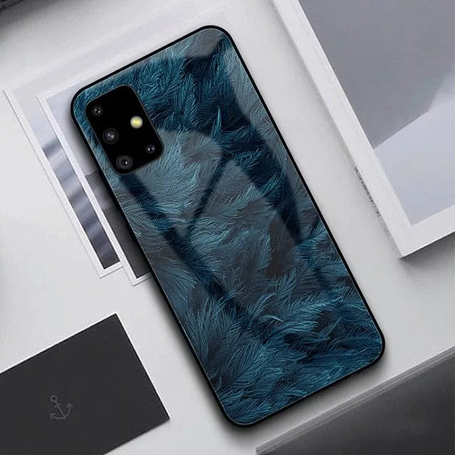 Black silicone phone case for Samsung and iPhone smartphones on a table