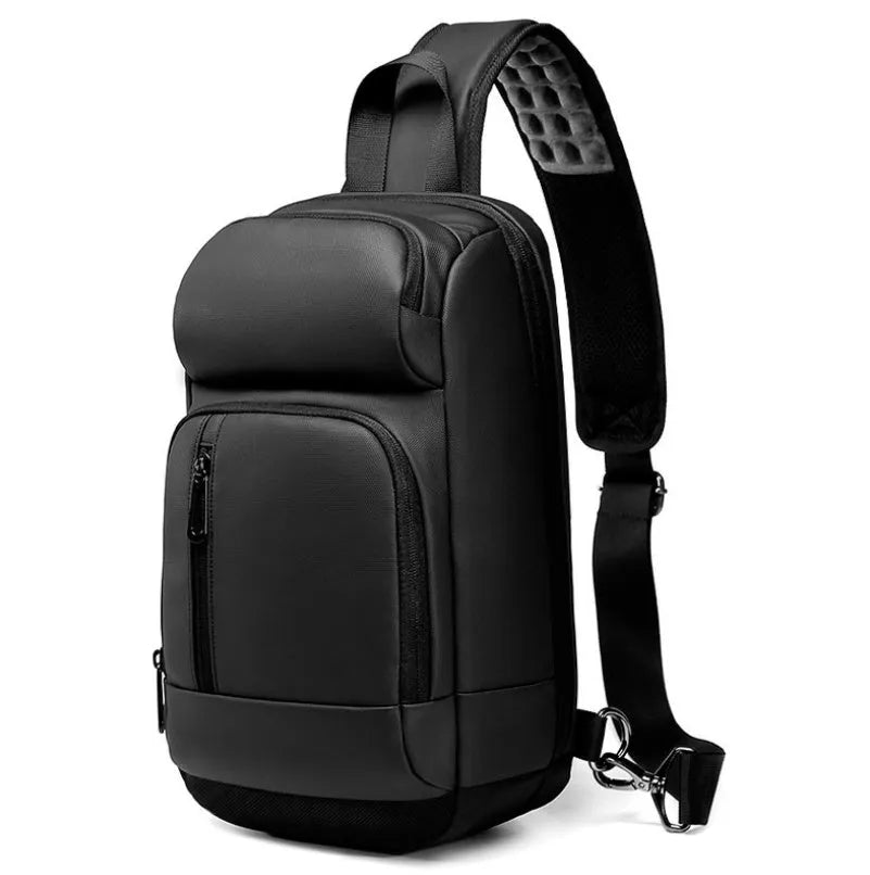 Black PVC medium-sized shoulder bag with air cushion strap and soft handle.
