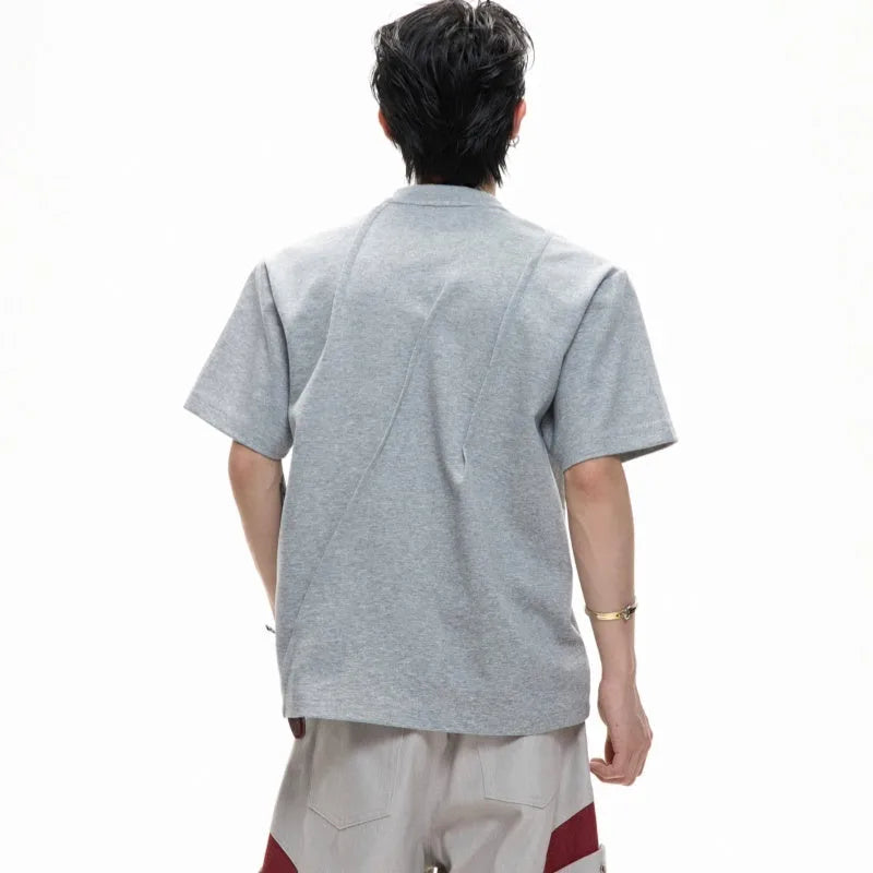 Men's cotton T-shirt with asymmetric stitching detail in solid colour and loose fit