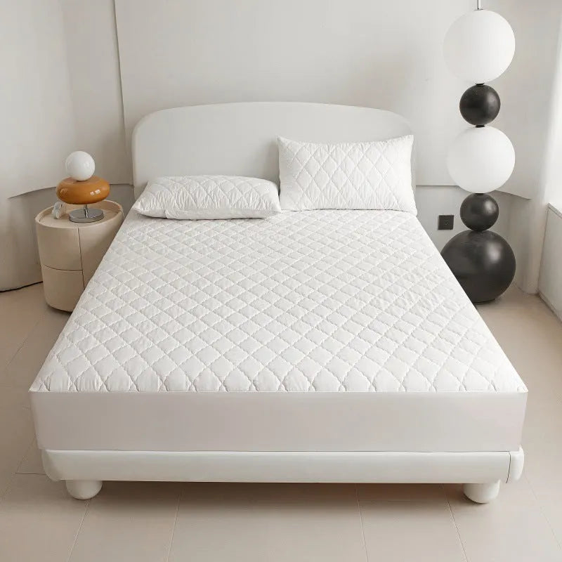 Diamond quilted bamboo fibre waterproof mattress protector fitted sheet and pillowcases set.