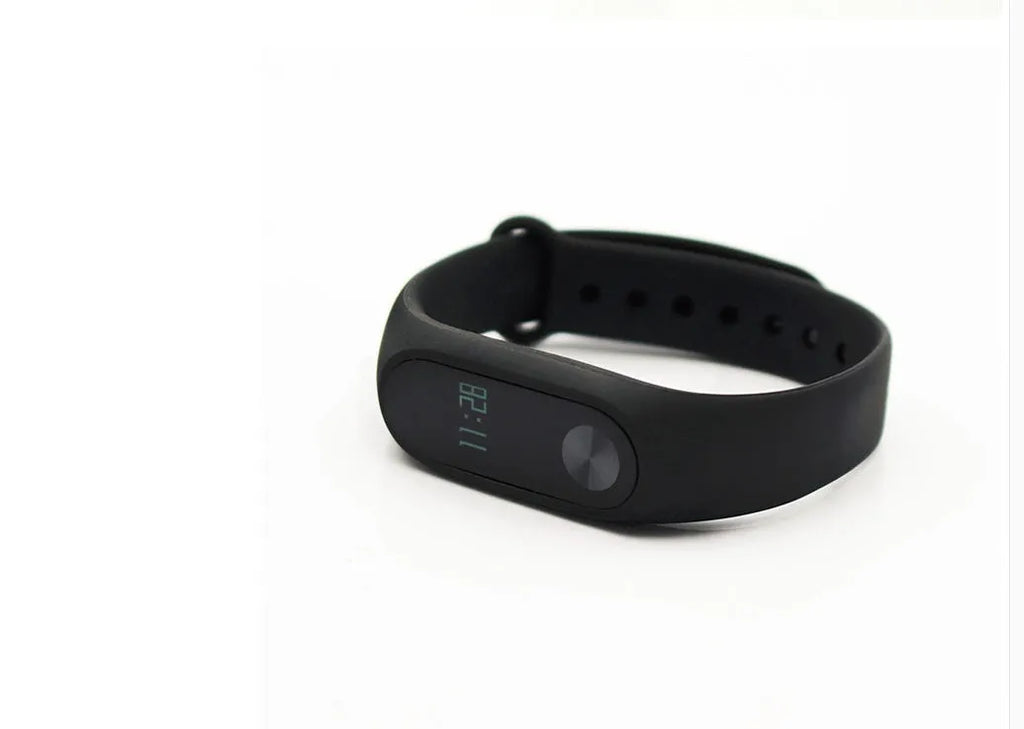Black Xiaomi Mi Band 2 smartband with OLED display on adjustable wrist strap