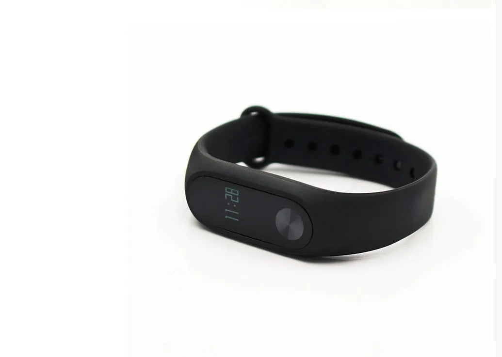 Black Xiaomi Mi Band 2 smartband with OLED display on adjustable wrist strap