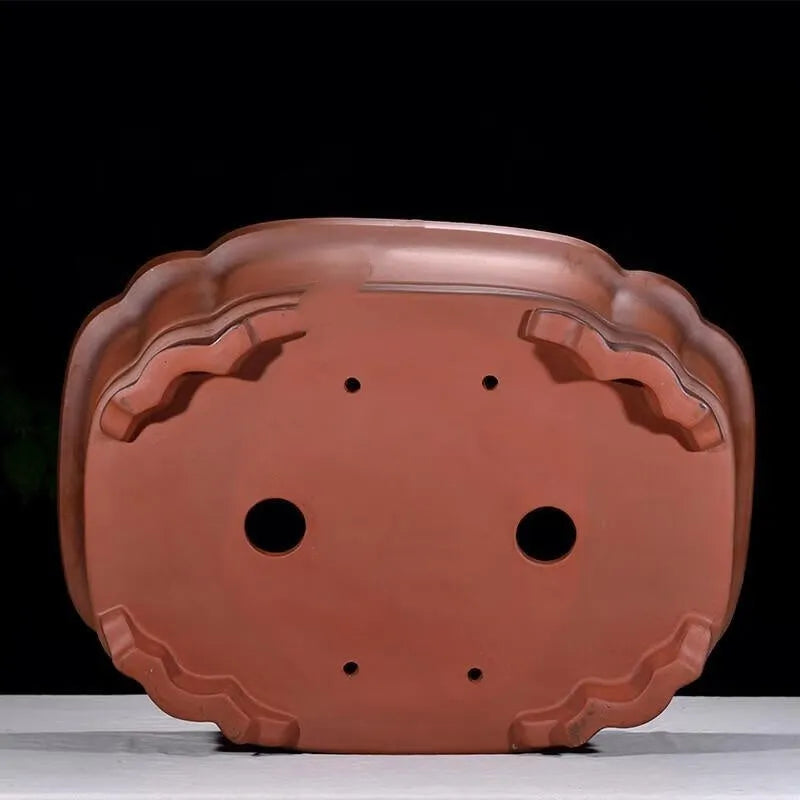 Large Chinese style purple clay flowerpot with antique jade finish and tree stump decoration