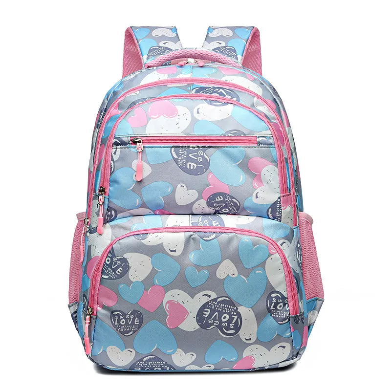 Blue children's school backpack with air pillow belt system for burden alleviation