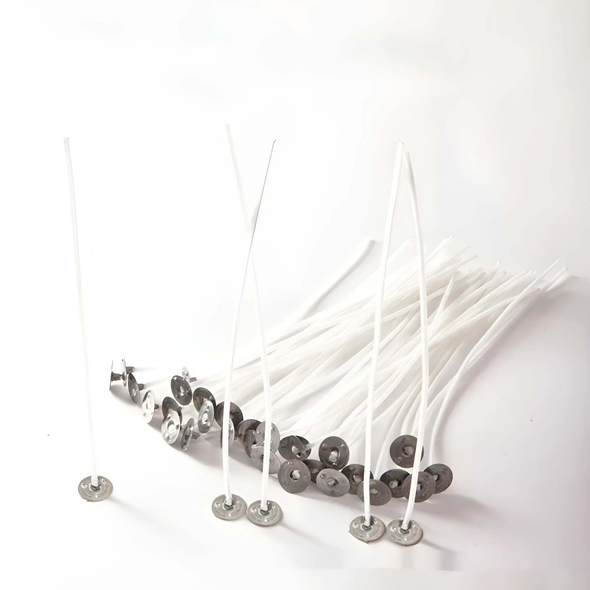 White cotton candle wicks in three lengths: 2.6cm, 6cm, and 8cm for DIY candle making