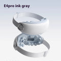 Steam Smart Bluetooth rechargeable eye hot compress massager in purplish grey colour on a table.