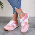 Women's oversized casual lace-up shoes with floral design in khaki colour showing round toe and cross-strap detailing